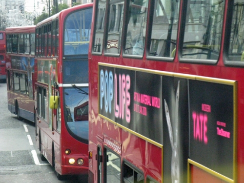 A wall of London busses.